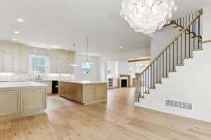Bright, spacious kitchen with island and hardwood floors.